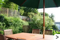 The lower garden has a perfect combination of areas for grown-ups and children alike.